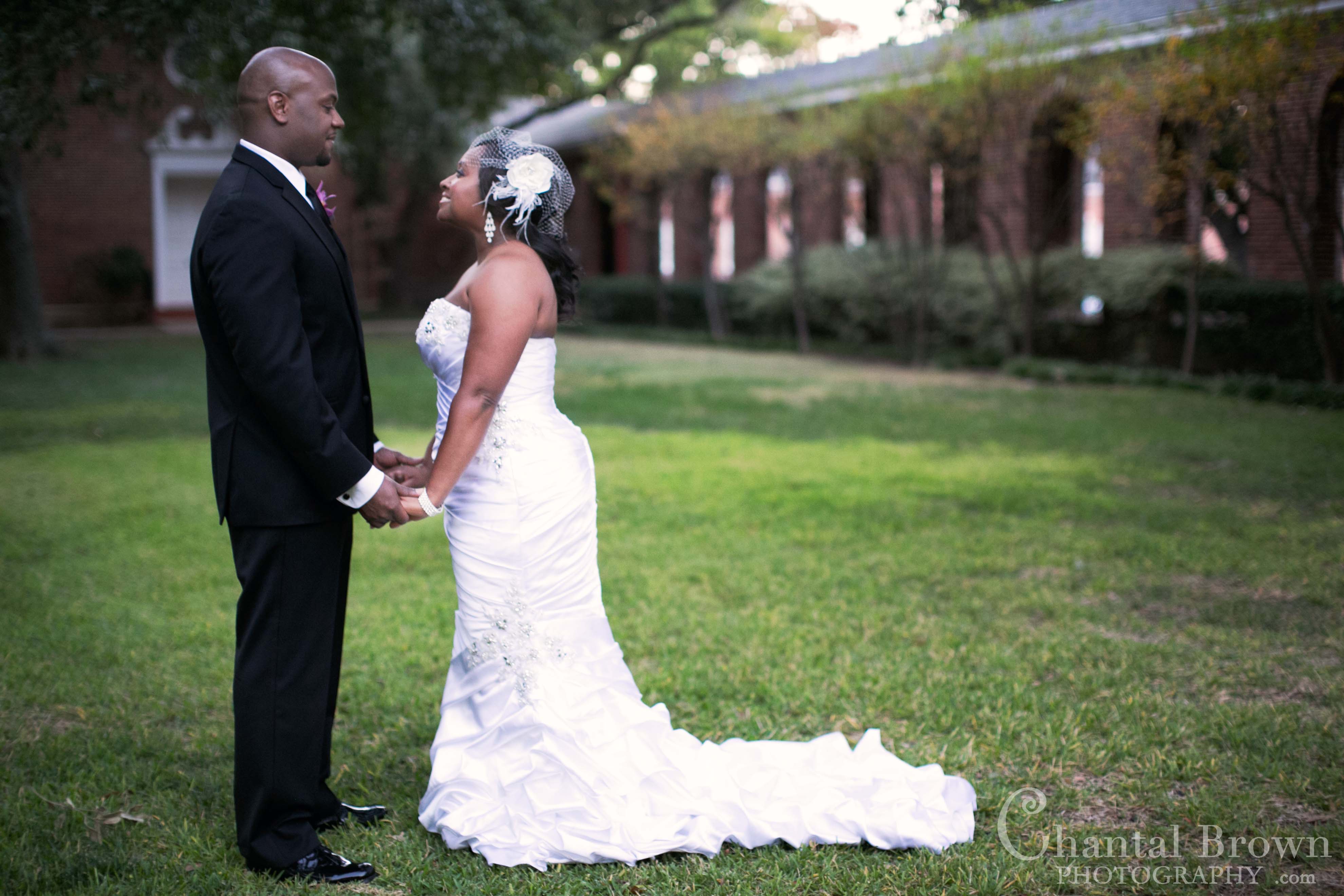 bride groom standing at Royal Lane Church ceremony by Dallas Wedding Photographer